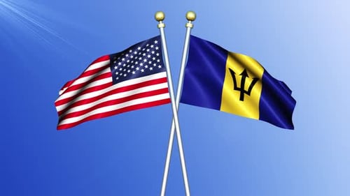 Waving United States and Barbados Flags on Cross Poles