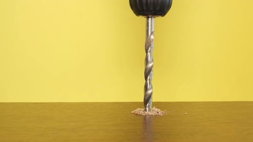 Drill Bit Drilling Wood Surface Close Up