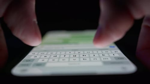 Phone close-up - people communicate using messenger, chat