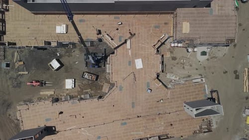 A Large Construction Site Construction Worker Doing Construction Work Aerial Top Down View