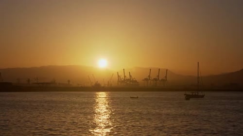 Cinematic, Dramatic Port of Naples. Early morning sunrise in the city.