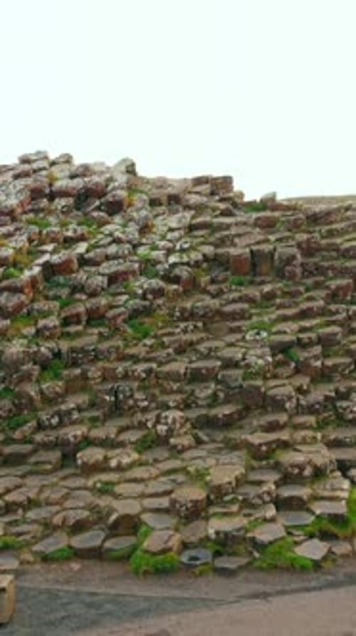 Push-in social ratio aerial video of The Giant's Causeway in Bushmills, Co. Antrim, Northern Ireland