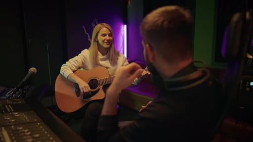 Audition in Recording Studio Talented Lady Guitarist Singing Song and Playing Musical Producer Man