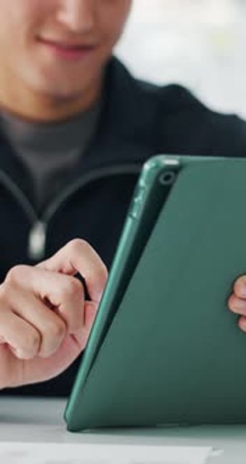 Hands, creative and person with tablet in office for research, proofreading article and fact check