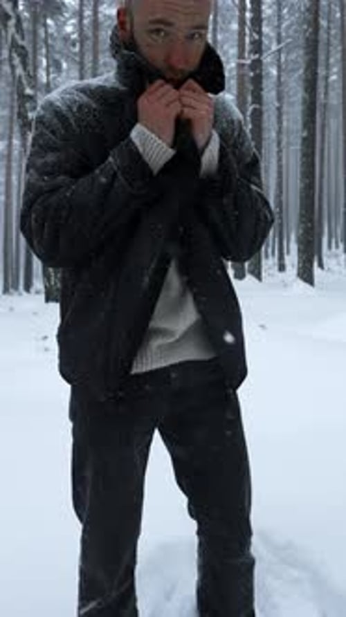 Stylish Man Poses in Winter Forest Media Shooting Stylish Man in Winter Forest Fashion Shooting of