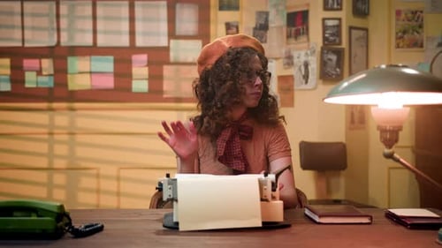 Girl in Yellow Beret in Retro Office Defiantly Types on Furry Typewriter at Her Workplace Secretary