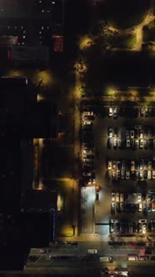 Aerial portrait above of New York Apartment Buildings and parked cars
