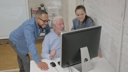 Multiracial People Doing Video Chat on Computer in Office