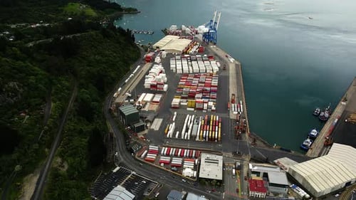 Shipping containers and loading dock in port chalmers in dunedin, New Zealand