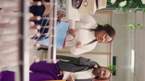 Vertical Video Women with Shopping Bags in Thrift Shop