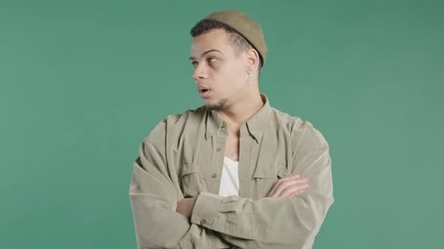 Annoyed Man Sighs Rolling Eyes On Green Backdrop Irritated Guy In Displeasure