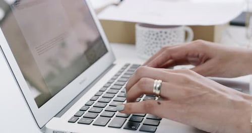 Typing on a Laptop Keyboard Close Up