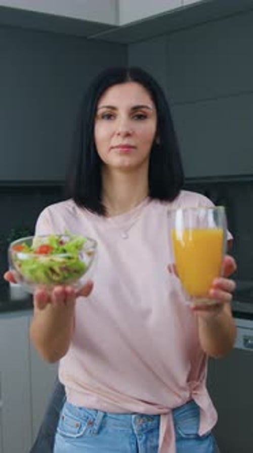 Woman Offering Healthy Food and Drink Choices
