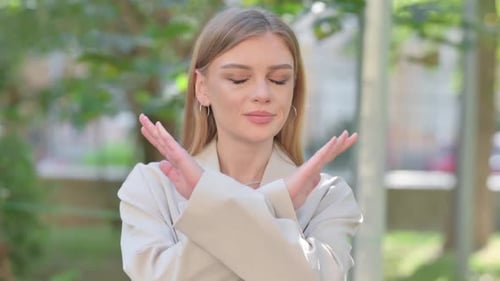 Outdoor Portrait of Tense Businesswoman in Denial