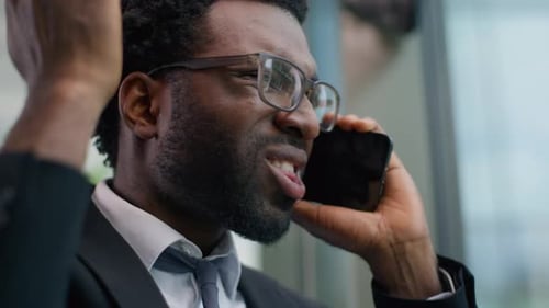 Close Up Furious African American Man Business Guy Male Businessman in Office Talking Mobile Phone