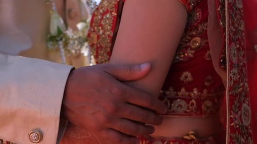 Close Up of Affectionate Wedding Embrace