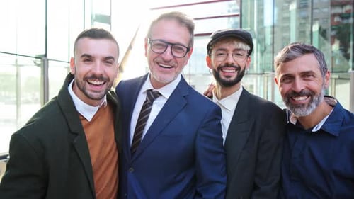 Four Smiling Friends Together Outdoors in City