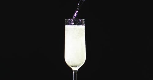 Champagne Being Poured into a Champagne Flute