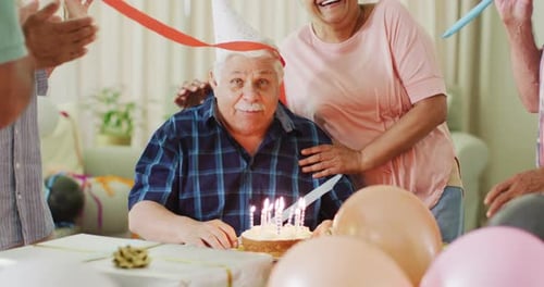 Senior Man Celebrates Birthday With Friends and Family