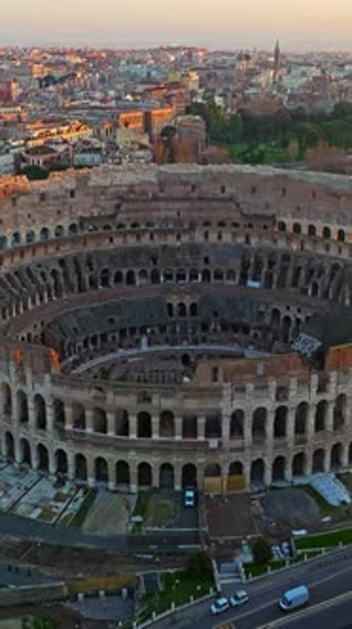 Aerial View of Iconic Ancient Arena of Colosseum at Sunset Flavian Amphitheatre in the Heart of Rome