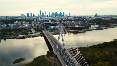 Aerial panorama of Warsaw, Poland at sunrise including Swietokrzyski Bridge over the Vistual river a