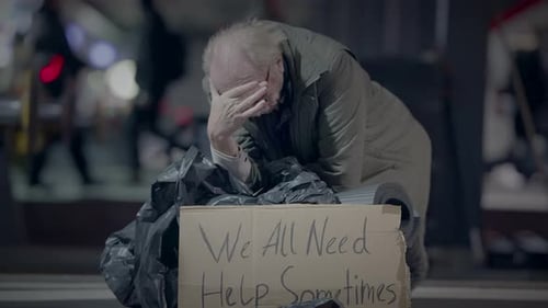 Elderly Homeless Man Suffering From Poverty Looking for Help at Train Station