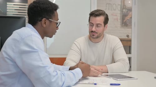 Relax Mixed Race Business People Talking in Office