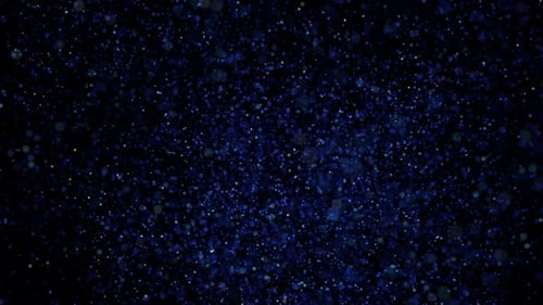 La
esfera redonda de energía azul abstracta explota en pequeñas partículas redondas. Vídeo 4k, 60 fps