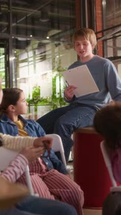 Young Adults at a Meeting in an Office