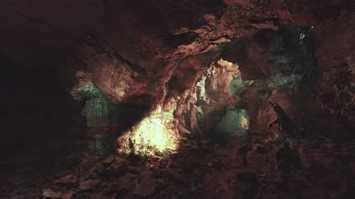 A Cave Filled with Lots of Rocks and Water