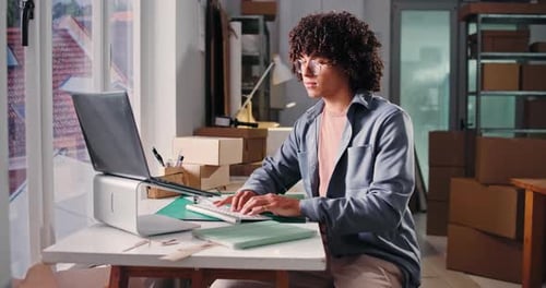 Ecommerce, laptop and research with man in warehouse for shipping, distribution