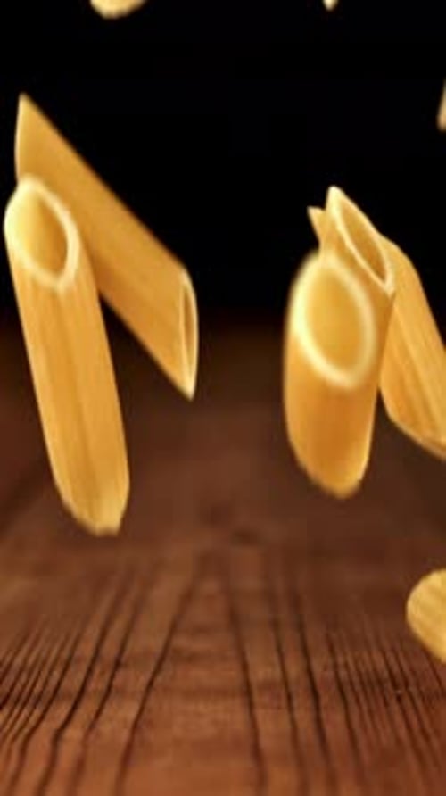 Super Slow Motion Dry Penne Pasta Filmed on a Highspeed Camera at 1000 Fps