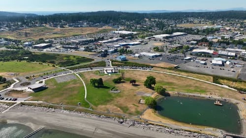 Drone View of Urban Park Adjacent to Commercial and Residential Area