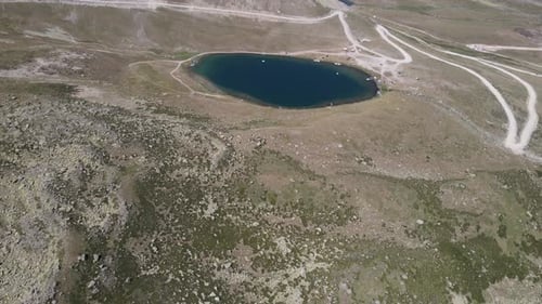 Aerial view of a small lake at the top of the mountain, a naturally formed lake, in Turkey