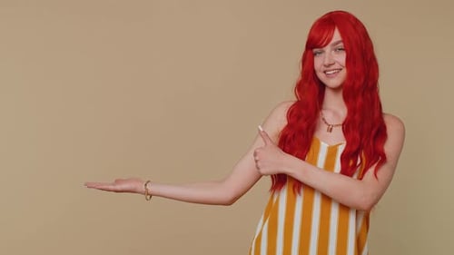 Girl Pointing Empty Place Advertising Area for Commercial Text Copy Space for Goods Promotion