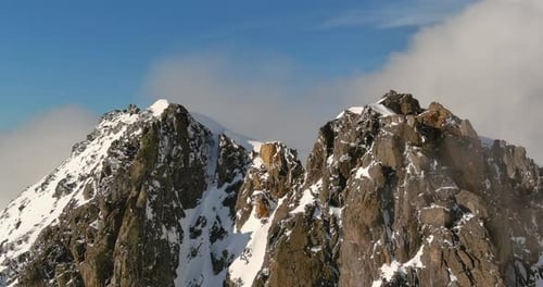 Snowy Mountain Peaks With Clouds Below. British Columbia, Canada.