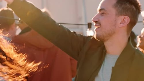 Dance, party or couple of friends at a rooftop social event in celebration of New Years with fun