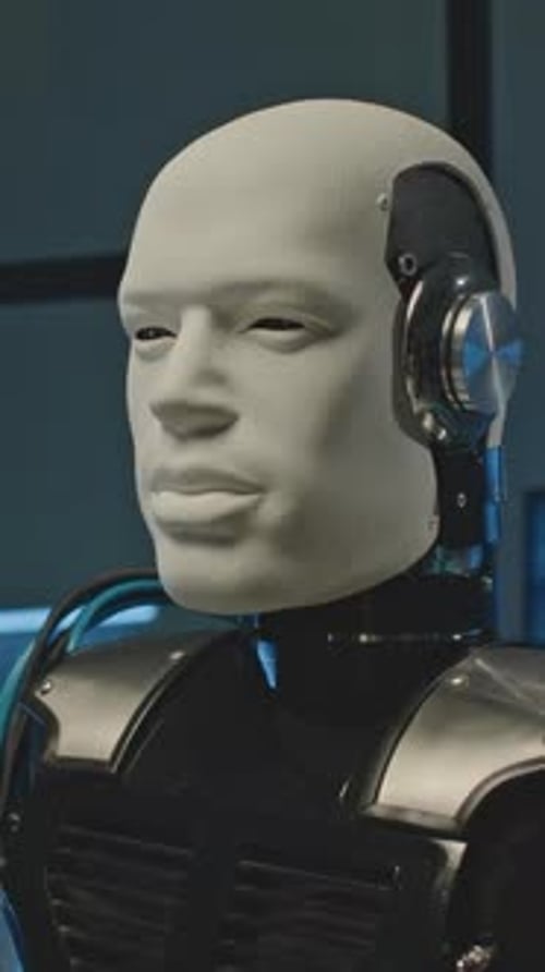 Close Up of Humanoid Robot in Dark Setting