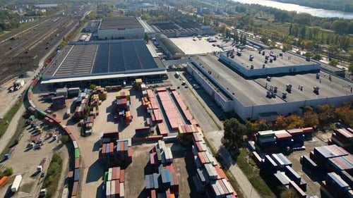 Aerial view of shipping containers, semi trucks cargo distribution of containers. Shipment from Chin