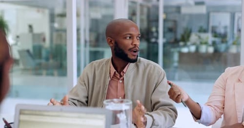 Discussion, meeting and black man talking to business people for planning