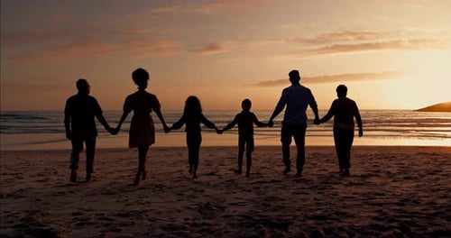 Big family silhouette, walking on beach and hands together for support, holiday