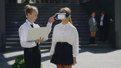 Two Young Little Office Workers Working Outside Using Virtual Reality Headset Boy is Wearing VR