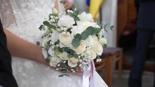 Bride Holding Elegant Wedding Bouquet Close Up