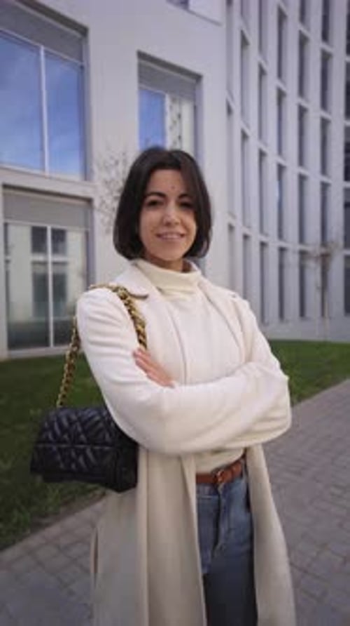 Vertical Video Smiling Young Indian Lady in Formal Suit Crossing Arms Looking Camera Business People