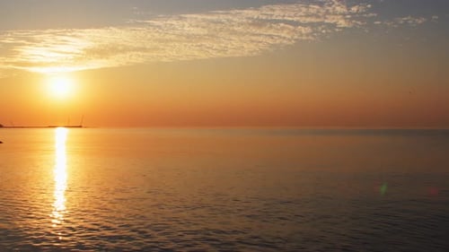 Sunset on the beach with orange sky