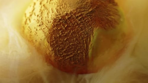 Golden Sphere in Golden Vaporous Liquid