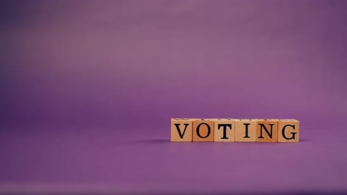 Purple Warm Background with Shadows Wooden Cubes with Black Letters and Laid Out Words From Letters