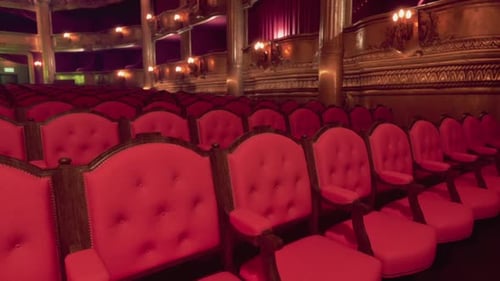 Interior View of an Old Opera House with Red Velvet Seating and Ornate Decor