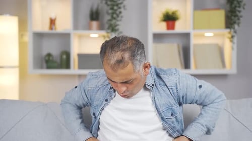 Man experiencing stomachache.