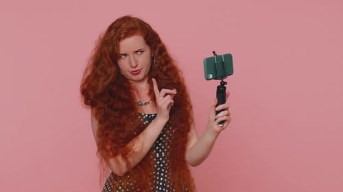 Woman Making Expressive Faces While Vlogging